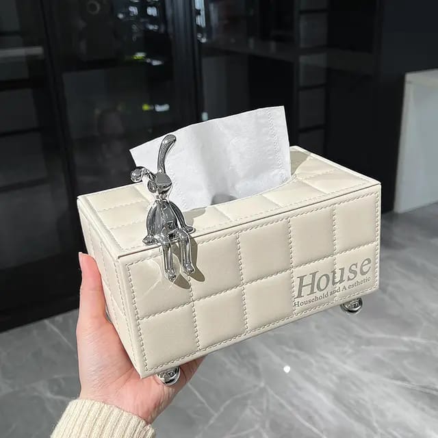 A rectangular ceramic napkin holder with a leather texture measuring 20 by 12 cm.