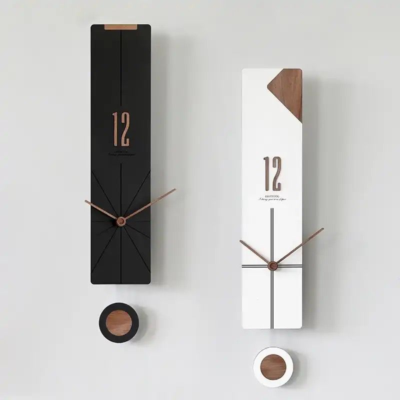 A rectangular wall clock with a swinging pendulum in a simple artistic design