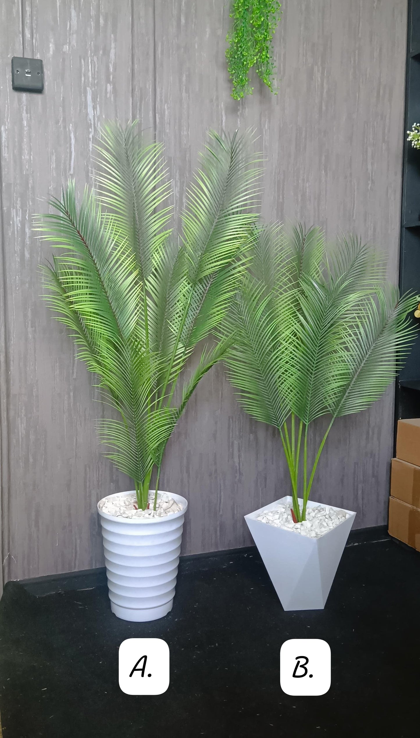 Tall, straight artificial flowers with green leaves