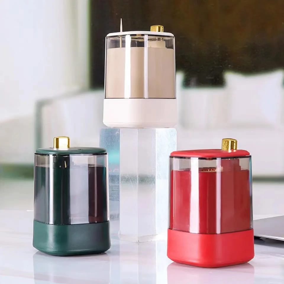 Set of three automatic press-up toothpick dispensers in white, green, and red, with clear upper sections and gold detailing.