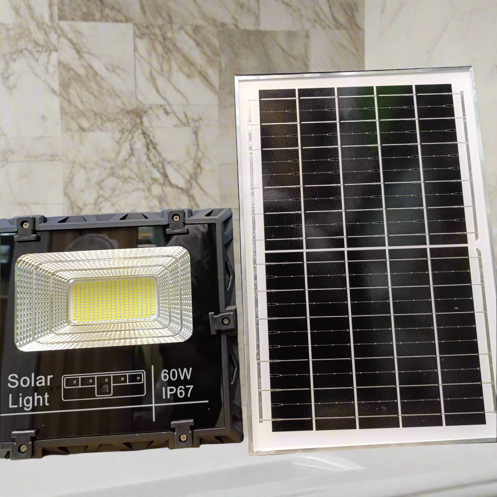 A black 60W solar floodlight with a large LED array.