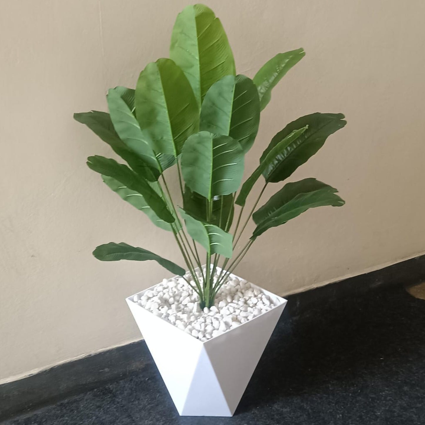 A 100cm tall artificial green plant in a decorative vase