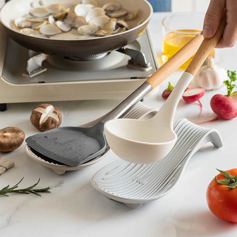 Flexible spoon rest