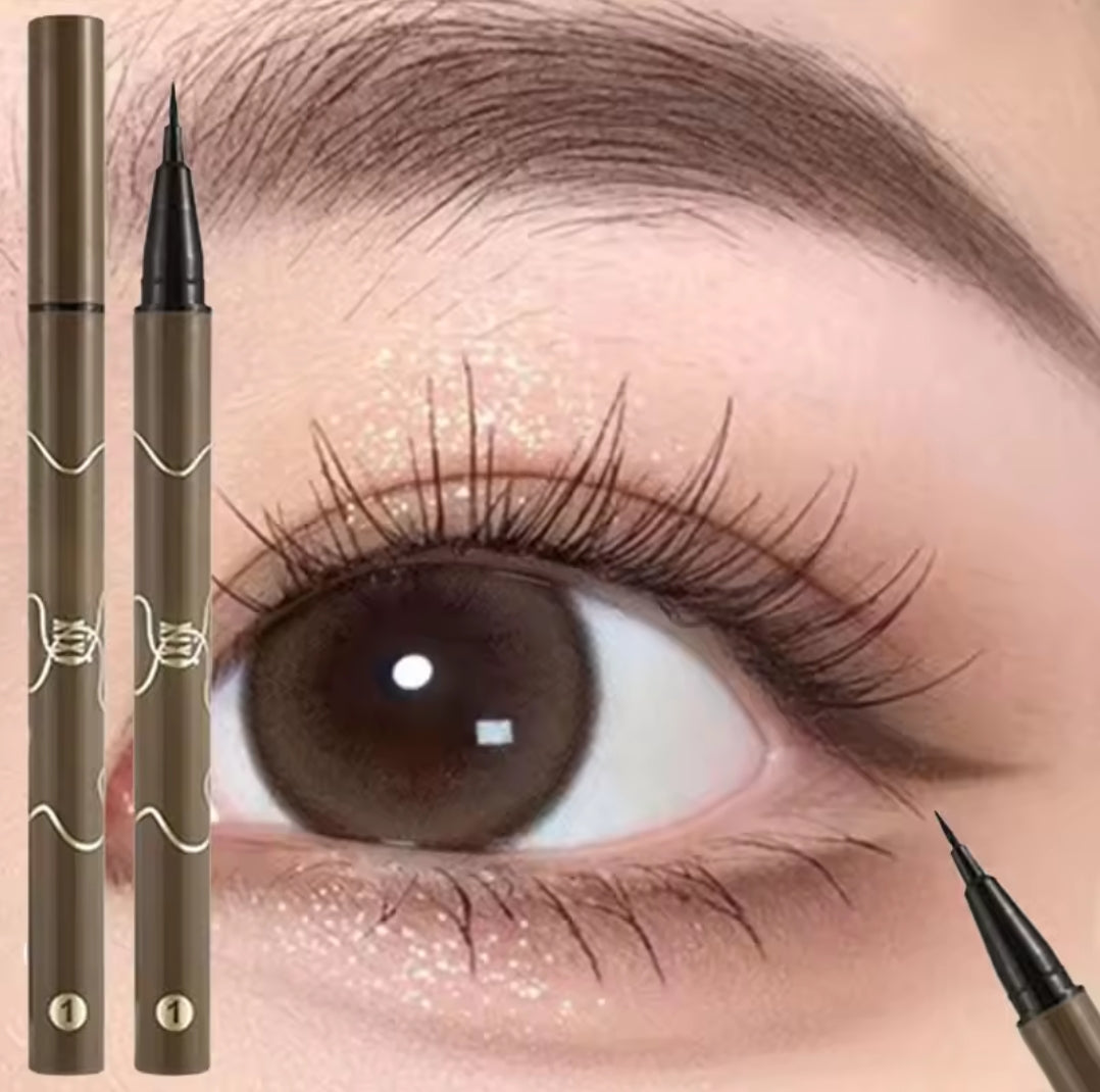 Two brown eyeliner pens displayed next to a close-up image of an eye wearing subtle winged eyeliner.