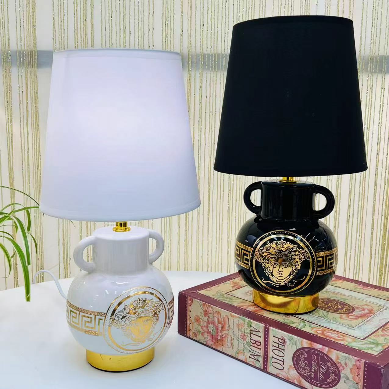 Creative table lamp with ceramic base and matching fabric shade.