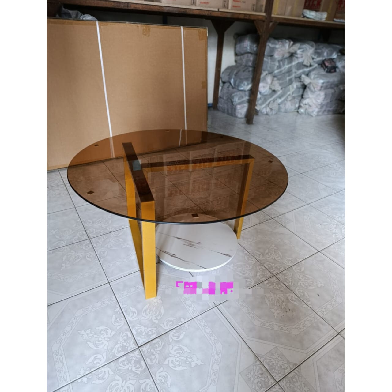 Round glass top coffee table