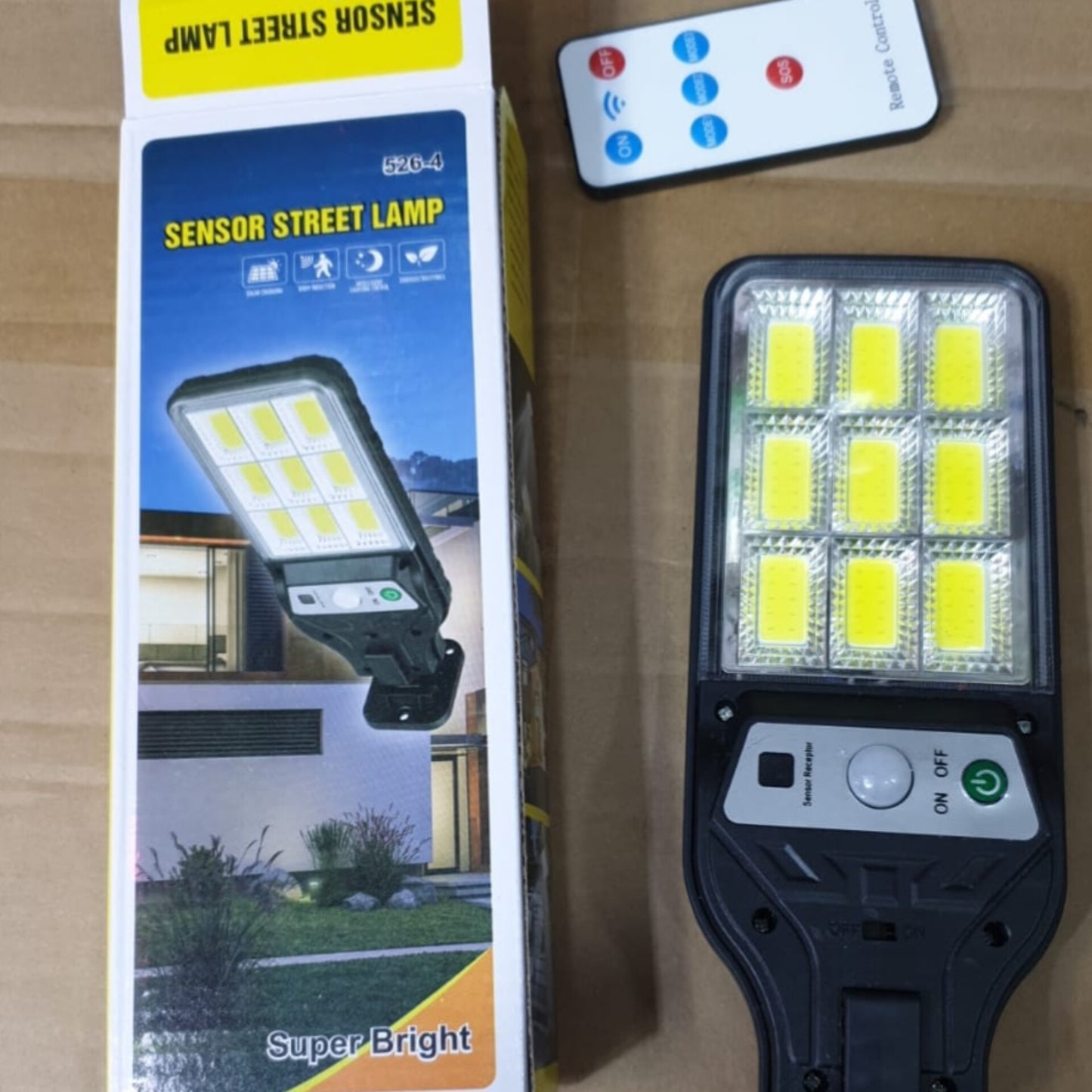 Solar street lamp with nine LED panels and a remote control.