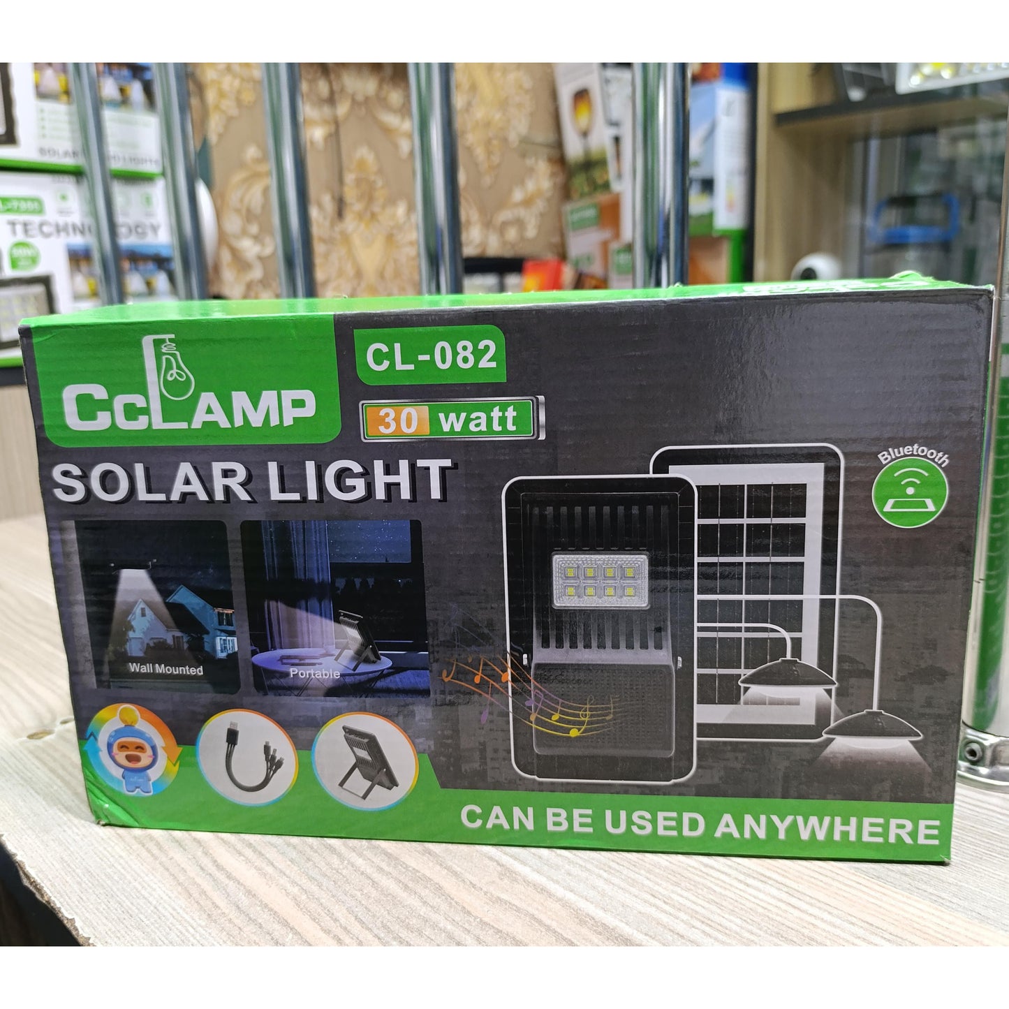 CcLamp CL 082 showing a 30W solar light unit, an external solar panel, and two pendant lamps.