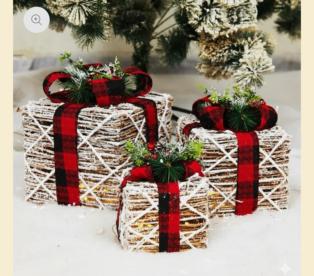 Decorative Christmas presents gift boxes with plaid ribbons on a snowy background