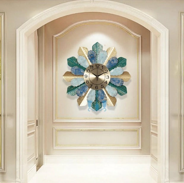 A decorative wall clock shaped like a flower with textured metal leaves in gold blue and teal.