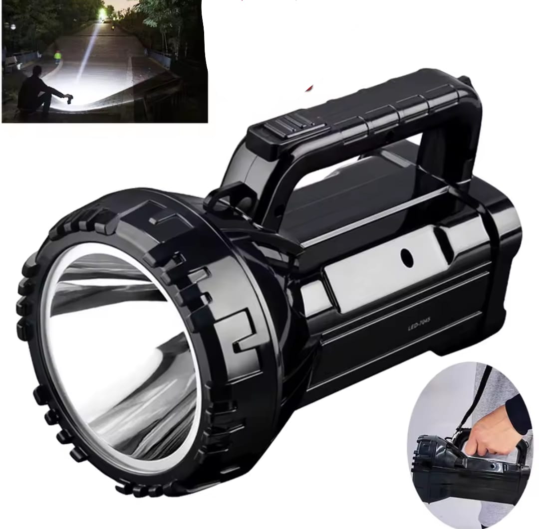 A black high power handheld rechargeable searchlight with a large lens and a top carry handle.
