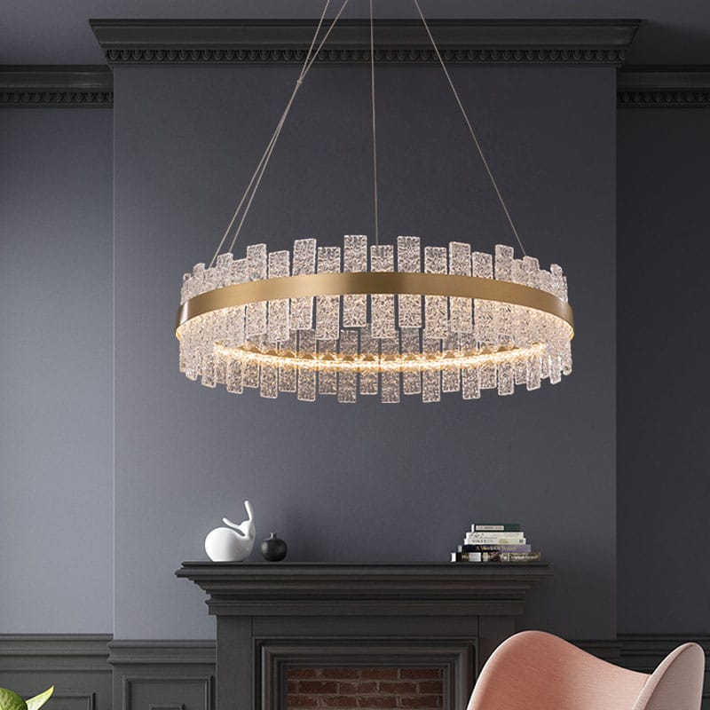 A circular gold and crystal chandelier
