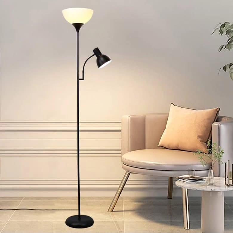 Black metal floor lamp with a white bowl-shaped up light and an adjustable smaller side reading lamp