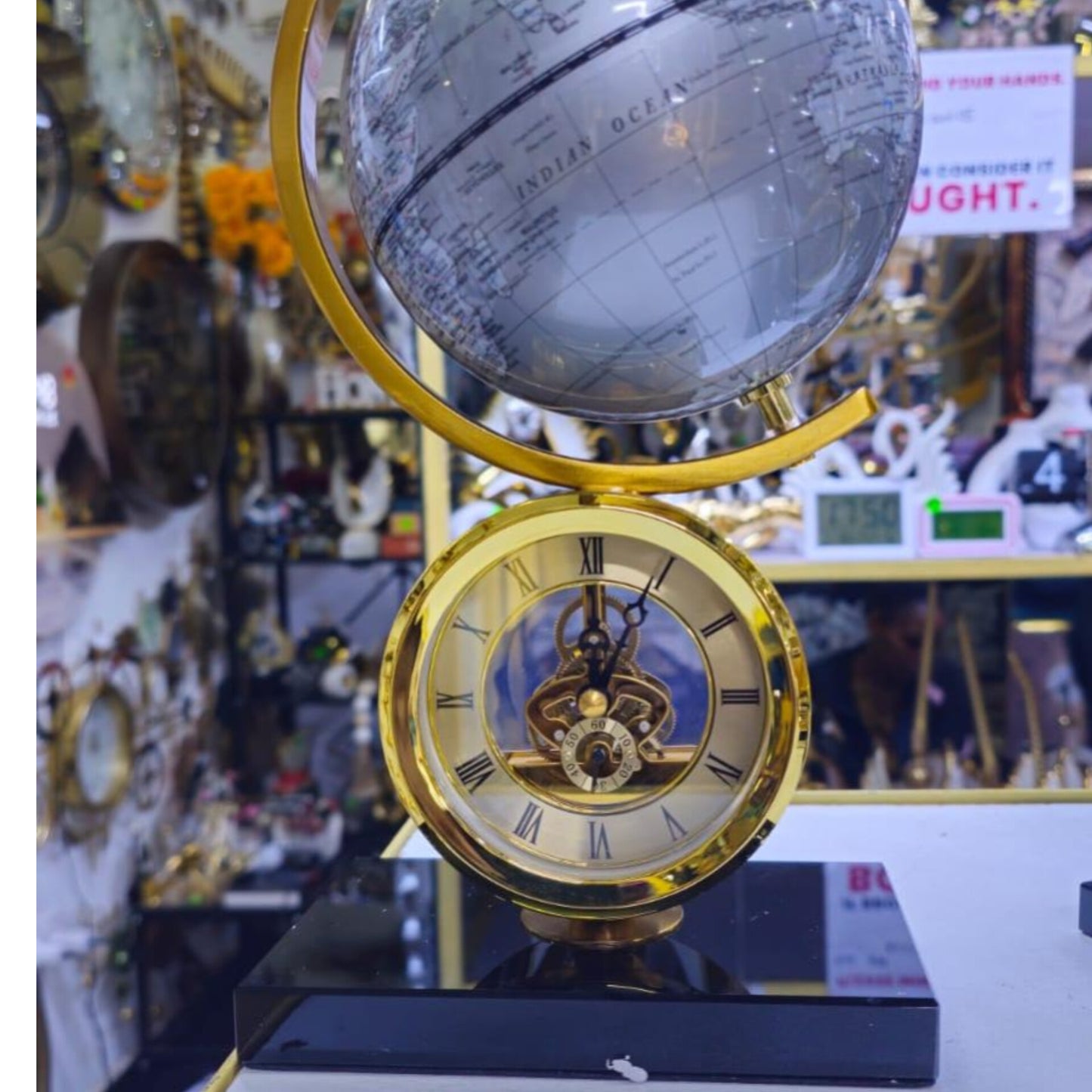 Table Clock with a Marble Base and Silver Globe