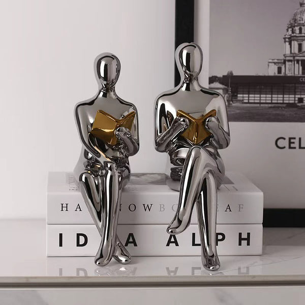 Silver Reader Bookend Sculptures