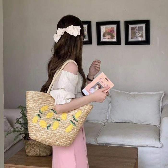 Embroidered straw bag