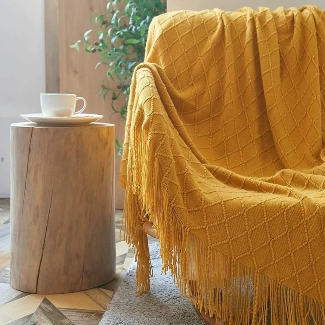 Knitted throw blankets with tassel