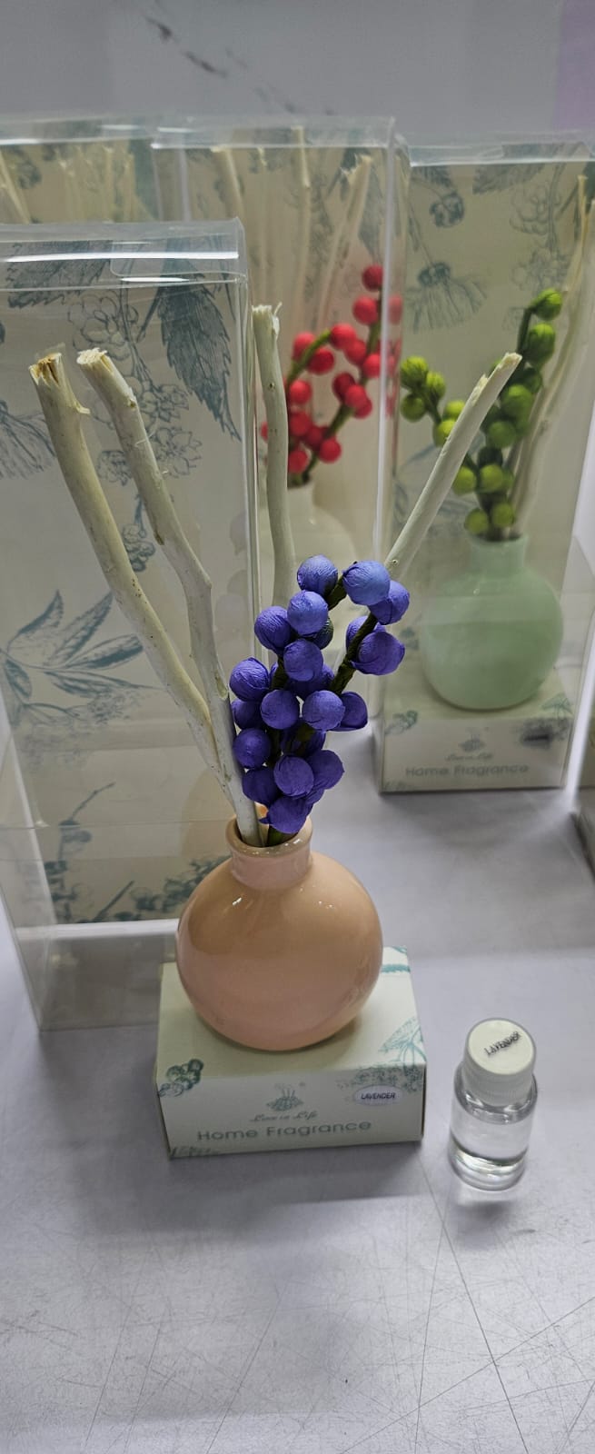 Decorate flowers, ceramic vase and reed diffuser