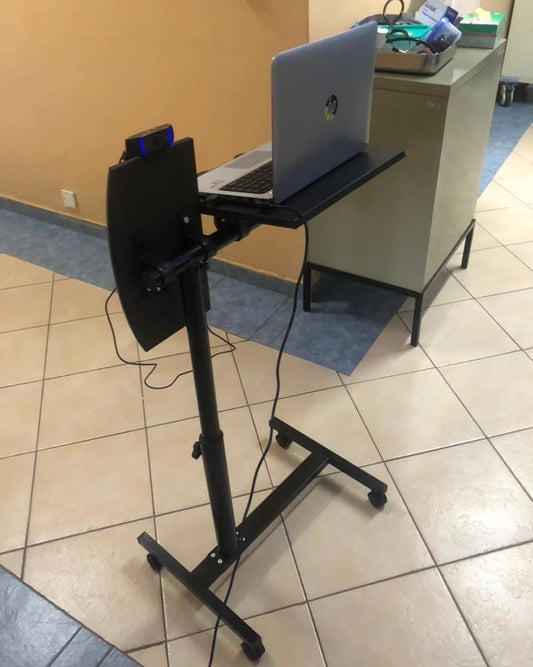 Moveable adjustable laptop stand