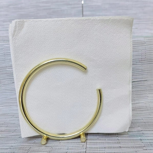 C shaped metallic serviette holder