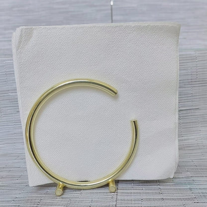 C shaped metallic serviette holder