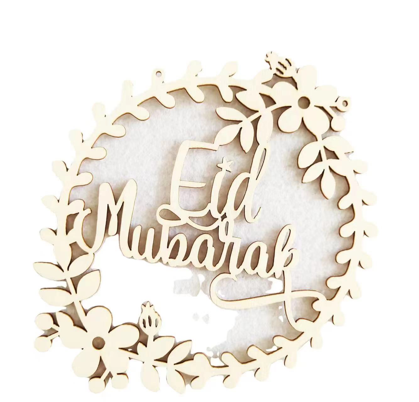 A 16 by 16 cm wooden Eid Mubarak decorative accent 