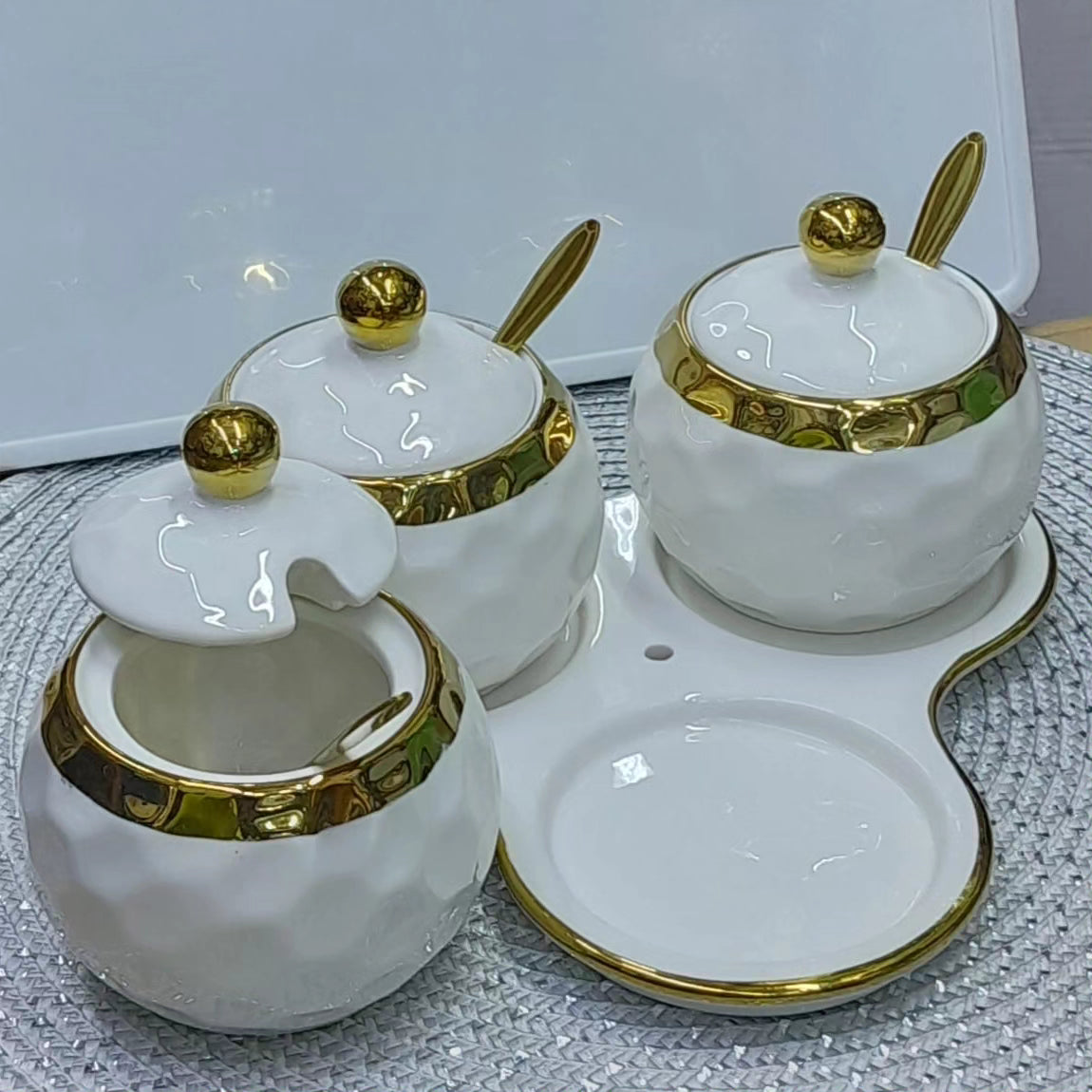 Ceramic cannisters set plus trays and spoons