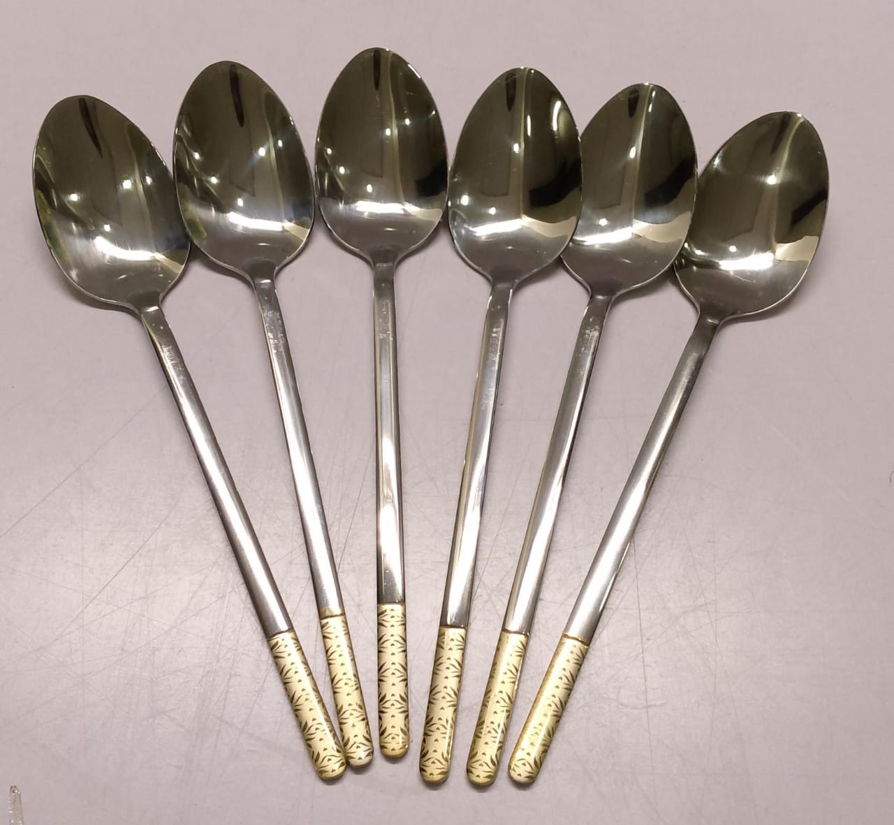 *Gold handle heavy stainless cutlery