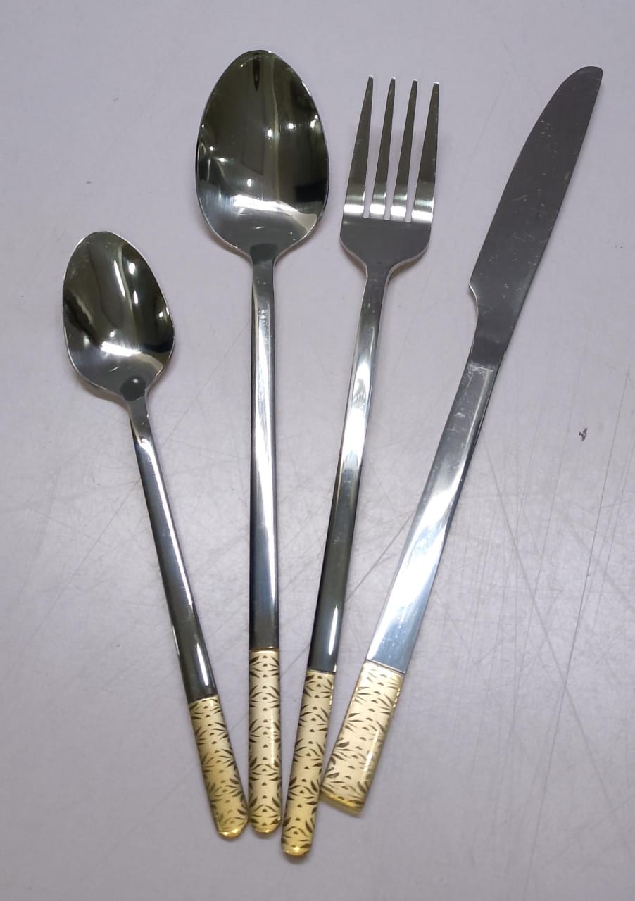 *Gold handle heavy stainless cutlery