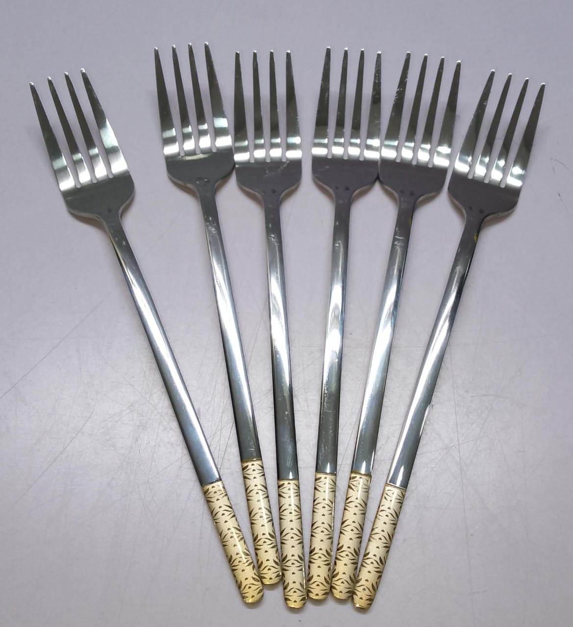 *Gold handle heavy stainless cutlery