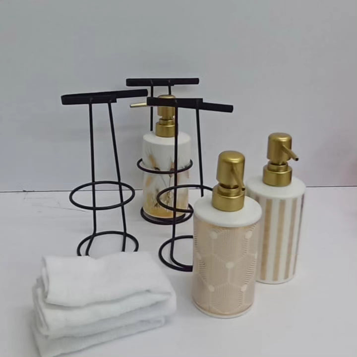 Soap dispenser with metallic stand and face towel