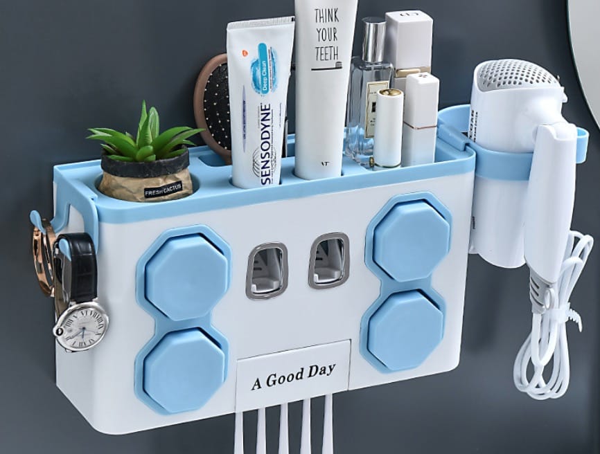 Toothpaste dispenser toothbrush holder