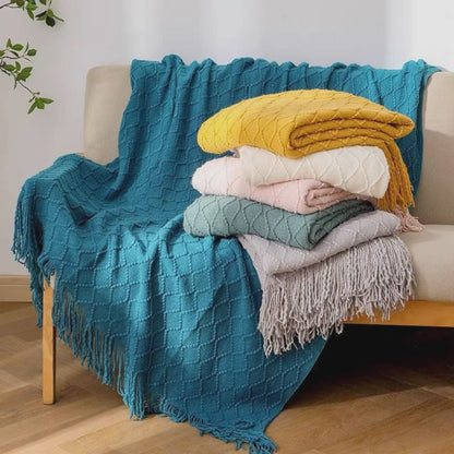 Knitted throw blankets with tassel