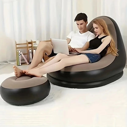 Inflatable sofa with foot rest