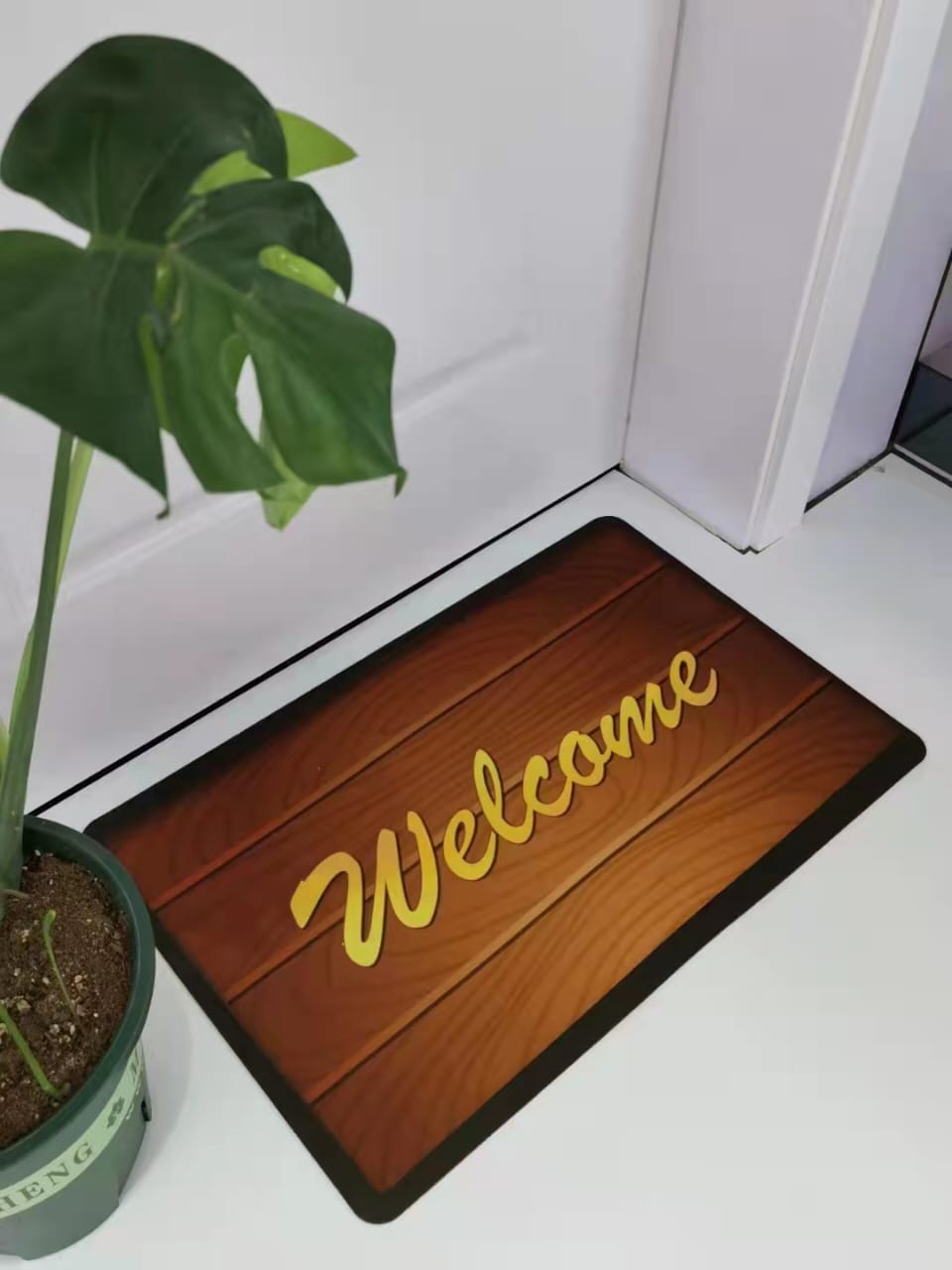 Door mat with rubber bottom