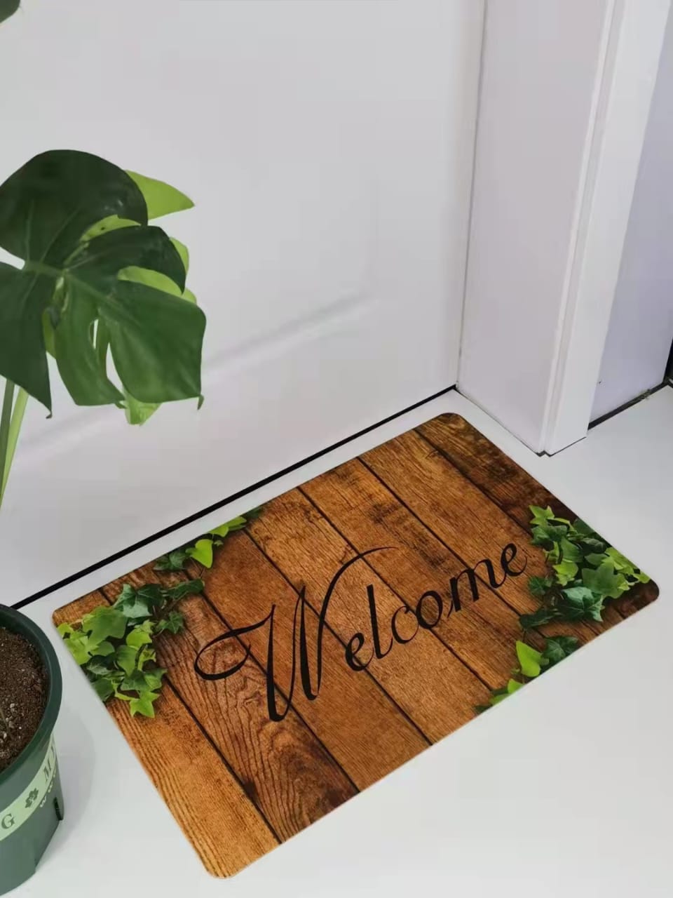 Door mat with rubber bottom