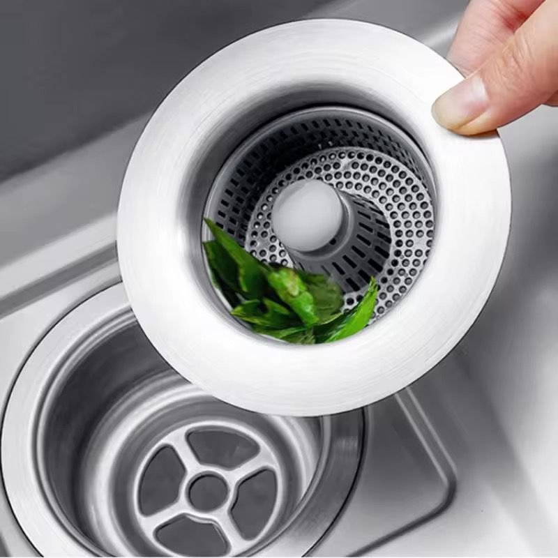 Sink strainer with pop up drain