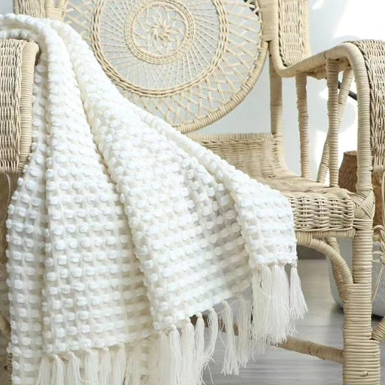 Knitted throw blanket