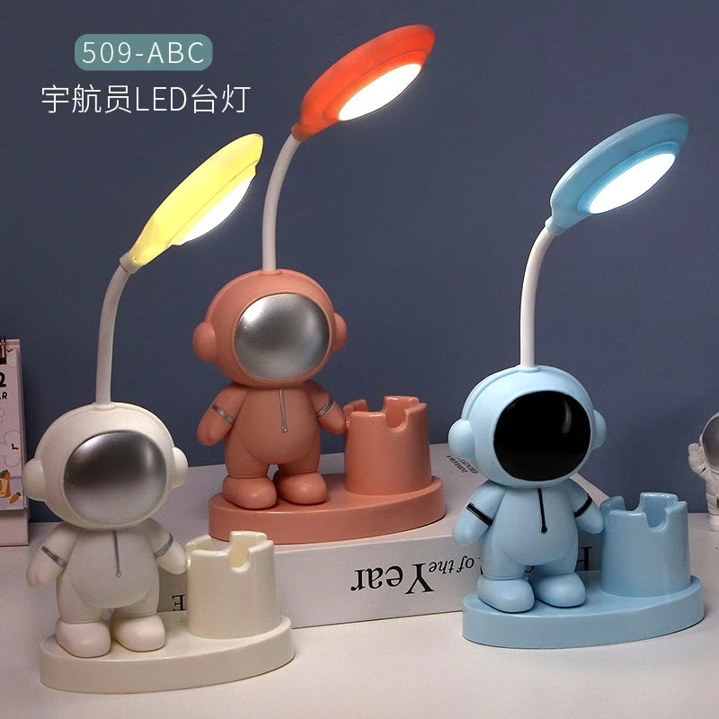 Astronaut themed led light lamp with pen holder