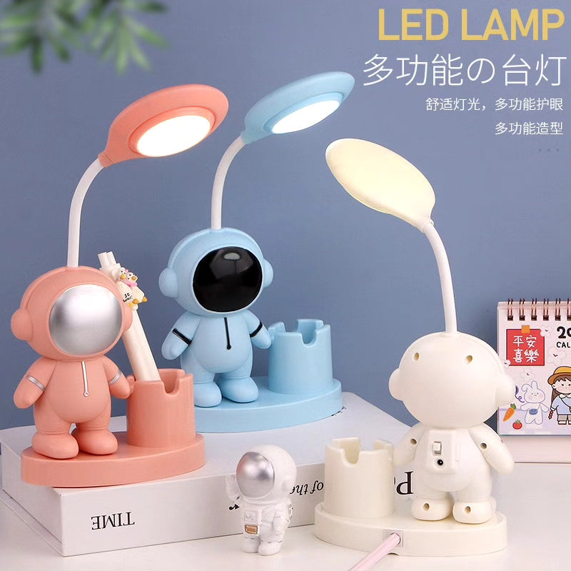 Astronaut themed led light lamp with pen holder