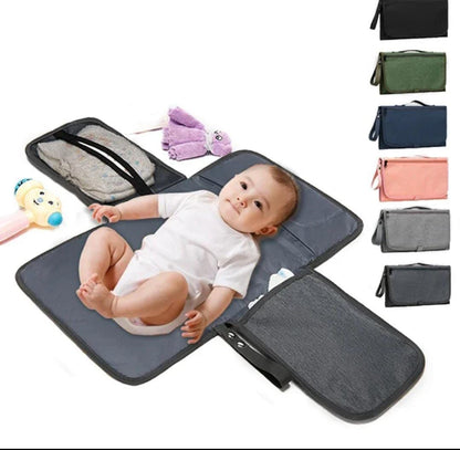Foldable baby changing mat with pockets