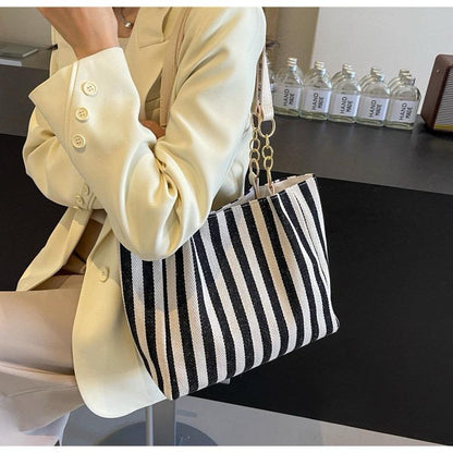 Simple stripped shoulder bag