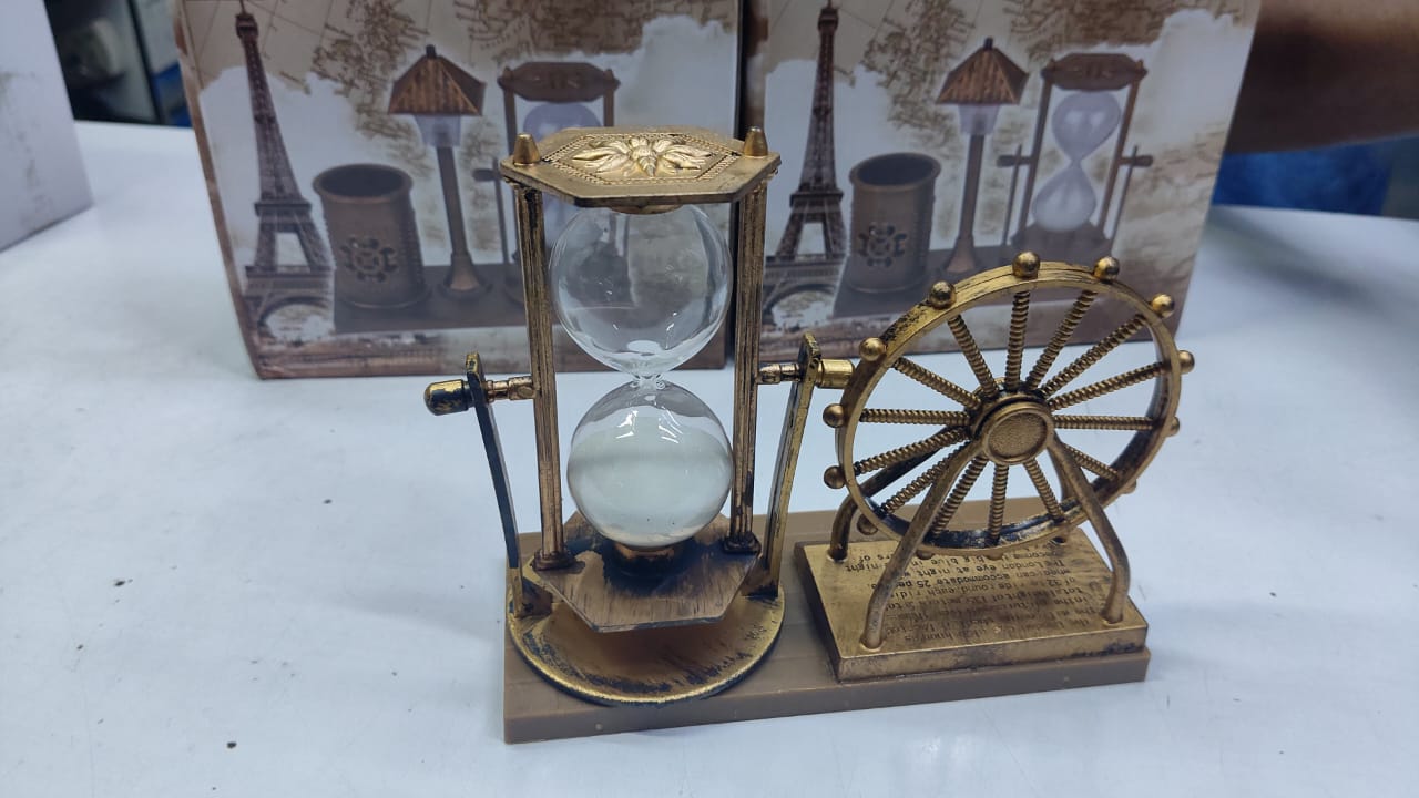 Silver ferris wheels and hour glass sand timer decor