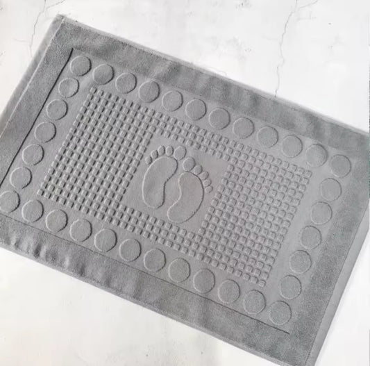 grey rectangular cotton bath mat