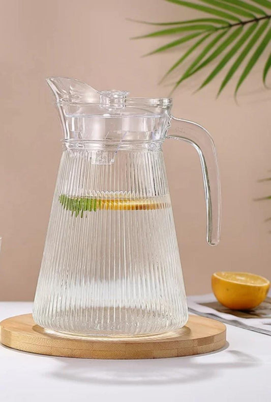 clear ribbed glass pitcher with a lid 