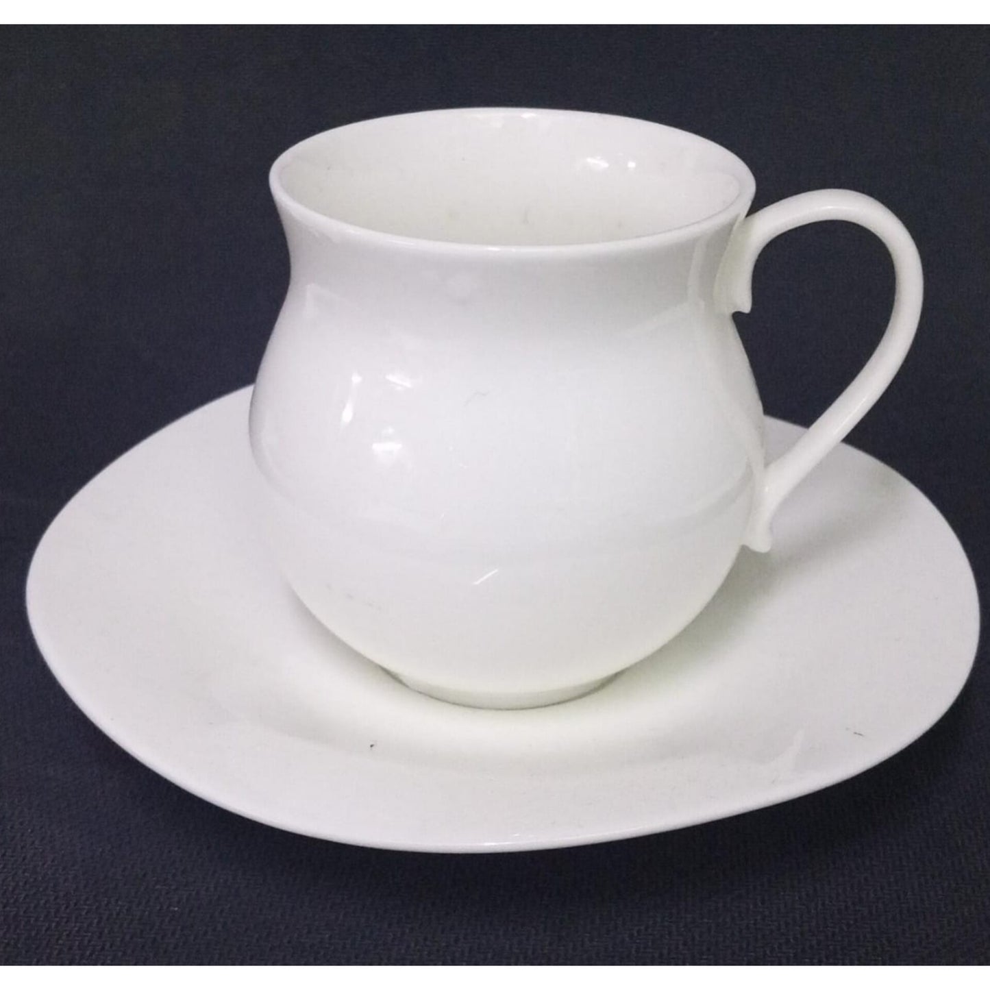 Cup and saucer nyungu with saucer