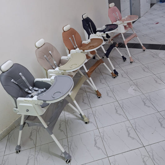 Row of adjustable multi-functional baby high chairs 