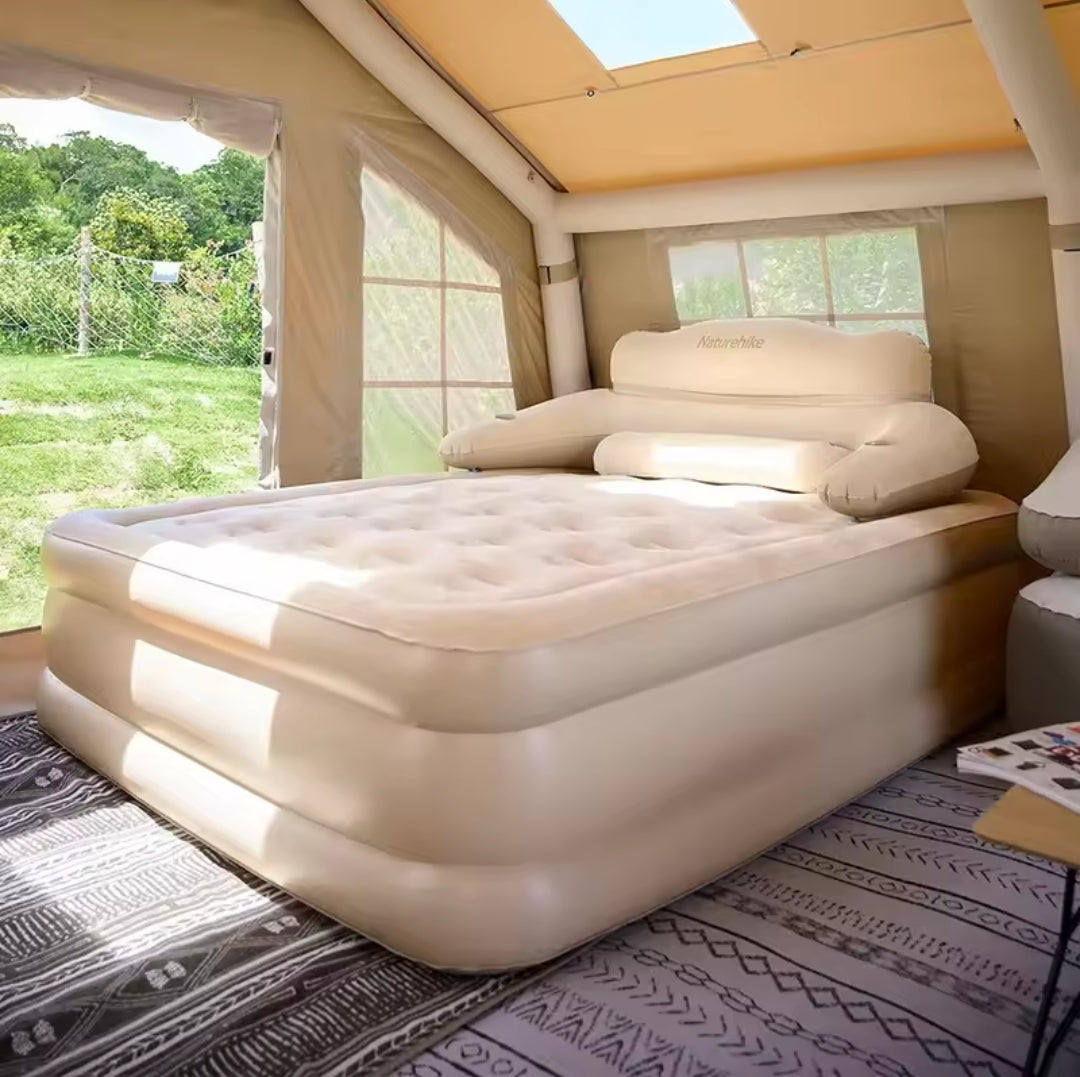 Inflatable bed with backrest and self pumping electric pump