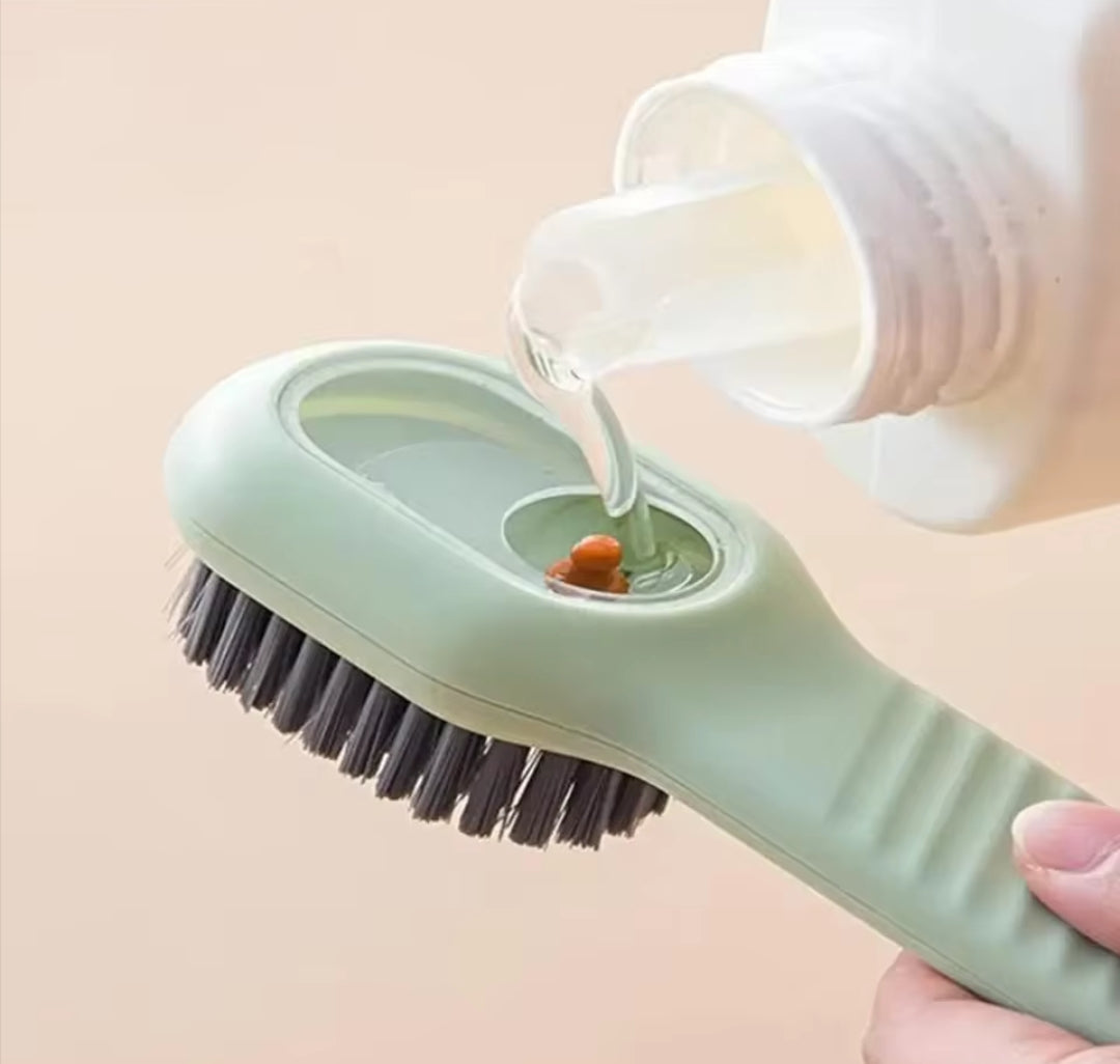 Multifunctional cleaning brush with soap dispenser