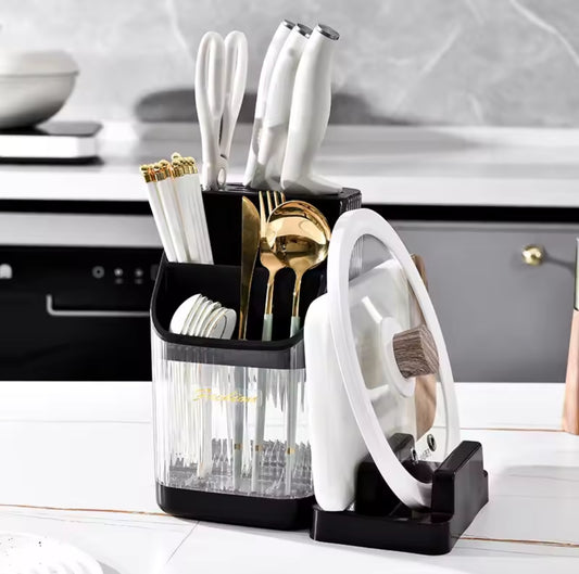 Cutlery holder with chopping board holder